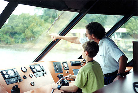 Justin and Poppop at the Helm